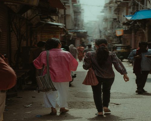 People walking at a comfortable pace on an Indian city street