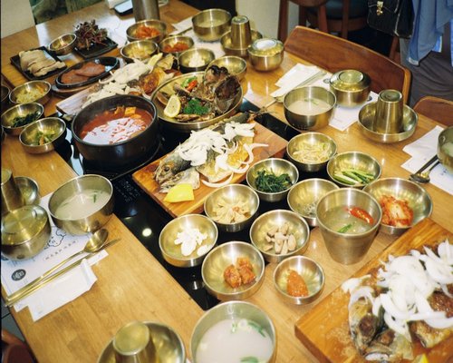 A traditional Indian home-cooked meal set on a dining table